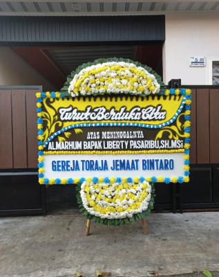 Papan Bunga Duka di Besi